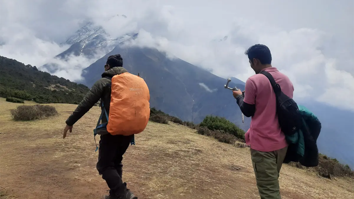 walking downhill from everest view hotel to namche bazaar