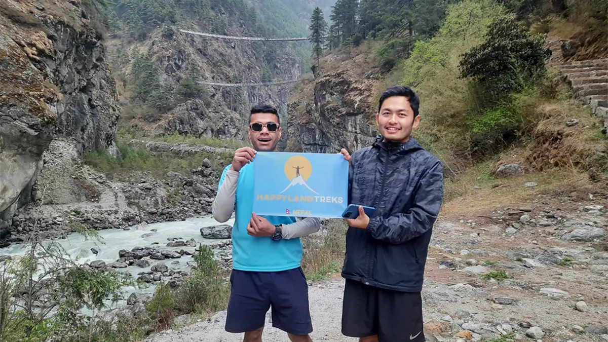 front of the hillary bridge on the way to Namche Bazaar while trekking to Everest vie and Everest base cmap