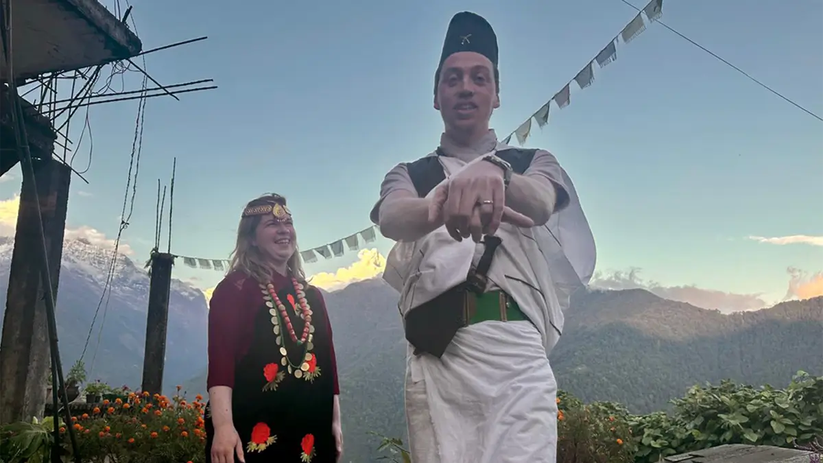 enjoying the gurung cultural dress in ghandruk and annapurna himalayas view on the back side, annapurna ghandruk kaski Nepal