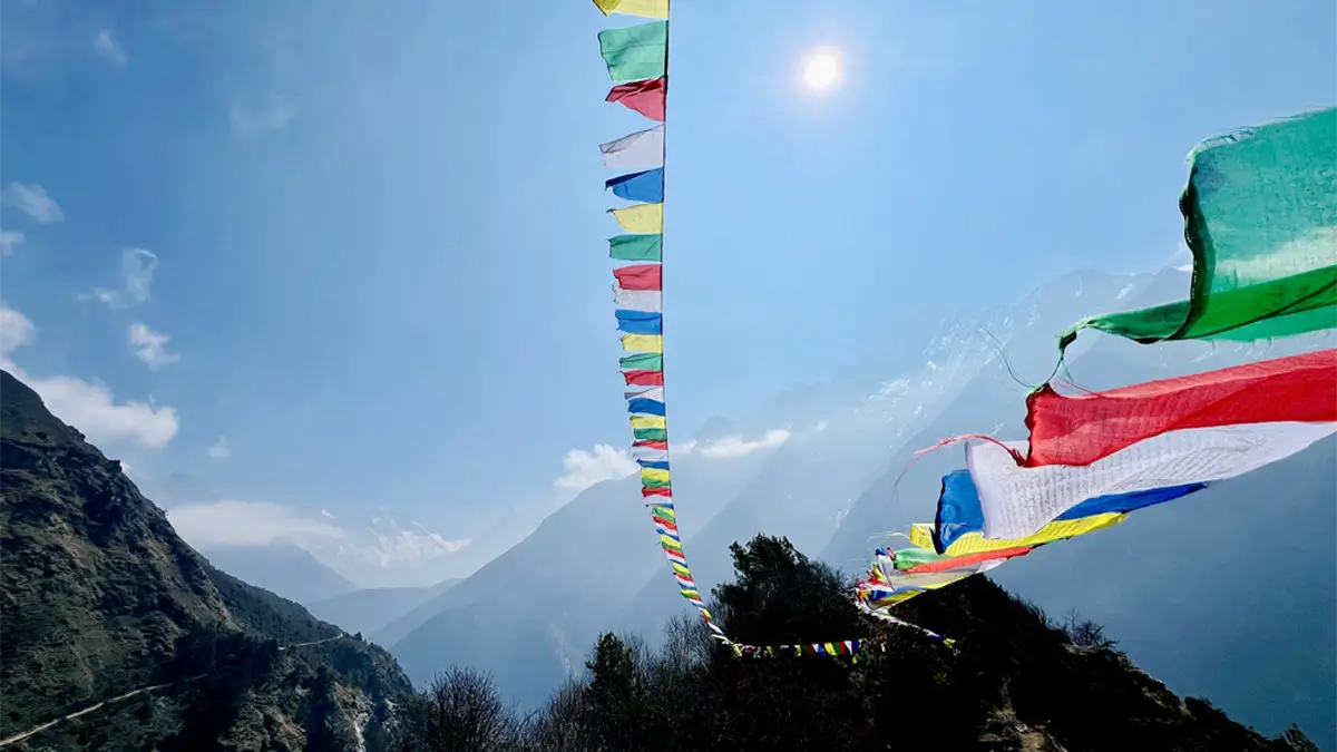 Tibetan prayer flag along the route to Everest base camp trail between Namche Bazar to Tengboche